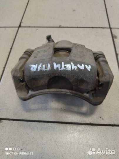 Суппорт тормозной передний правый Chevrolet