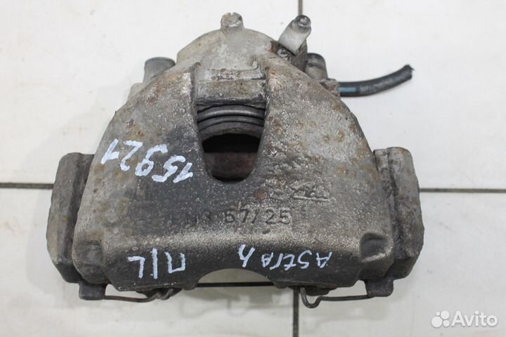 Суппорт тормозной передний левый Opel Astra H