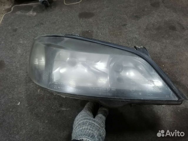 Фара левая Opel Astra G