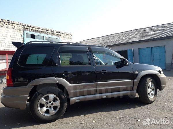 Mazda Tribute накладки на пороги