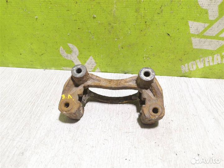 Скоба суппорта заднего Киа Сепия Шума 96-01