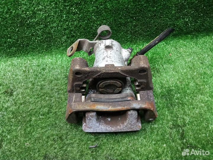 Суппорт задний левый Opel Astra H (2004-2014)