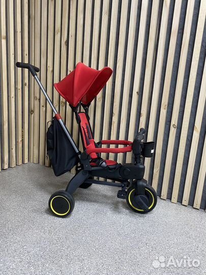 Трехколесный велосипед с ручкой