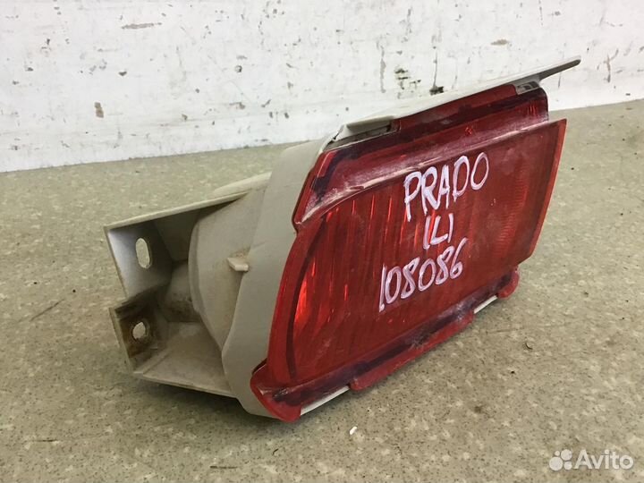 Фонарь задний в бампер левый Toyota Land Cruiser