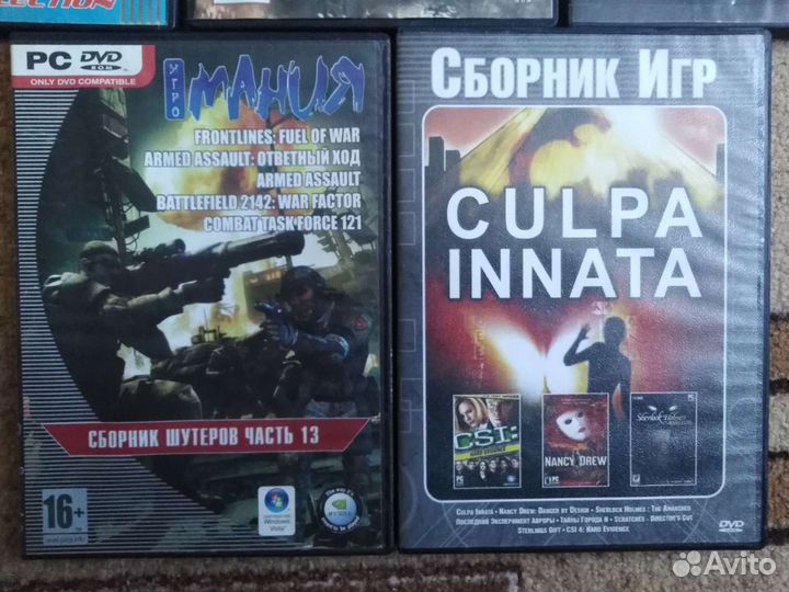 Пять дисков с играми + два диска с мультами