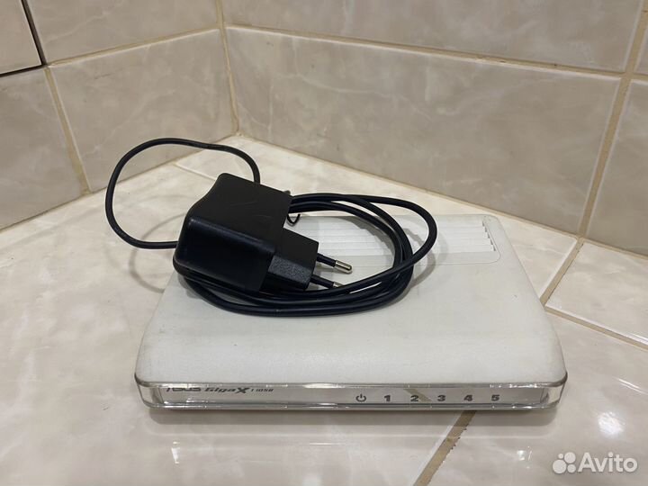 Коммутатор asus GigaX1005B