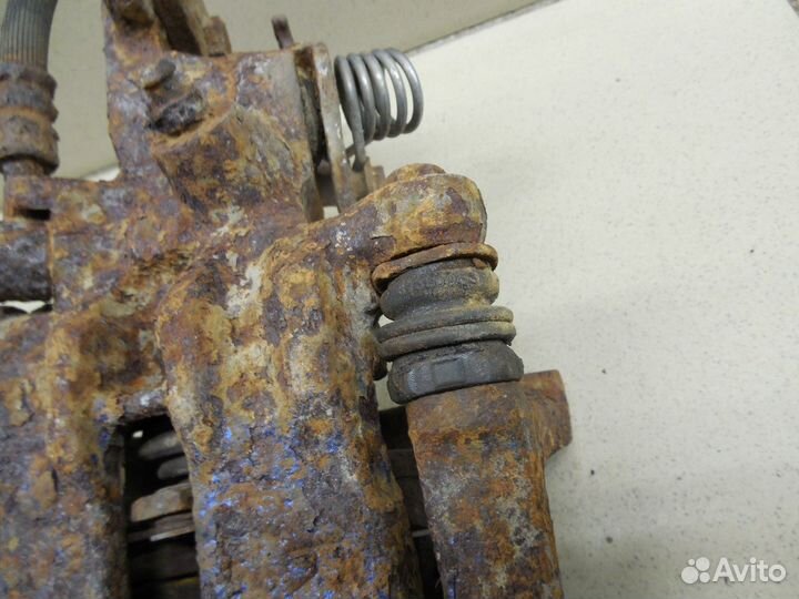 Суппорт задний правый Primera P11E 1996-2002