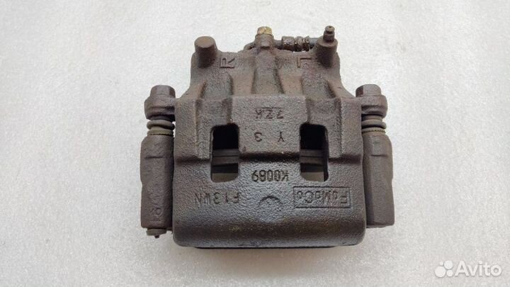 Суппорт тормозной передний левый Mazda Cx-7 ER