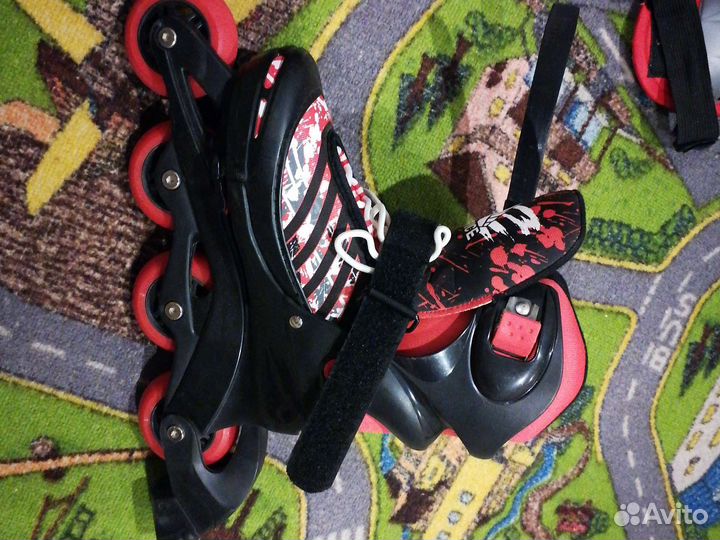 Роликовые коньки