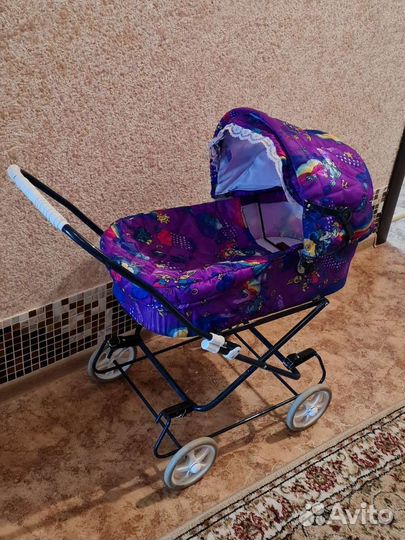 Игрушечная коляска
