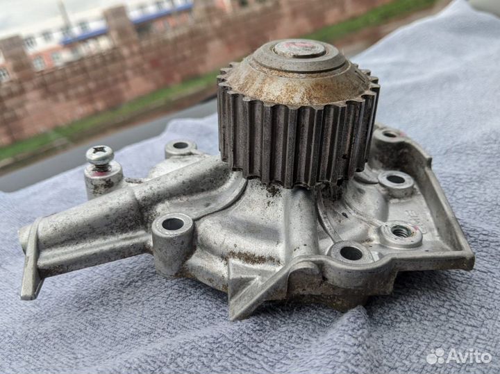 Насос водяной (помпа) Chevrolet Aveo