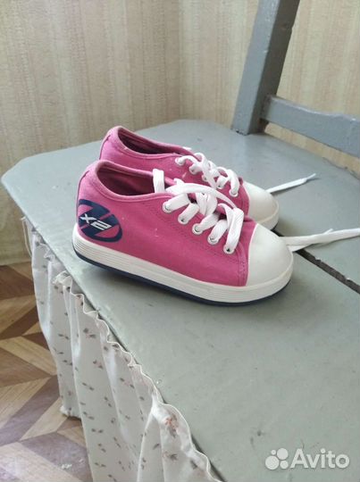 Роликовые кроссовки heelys