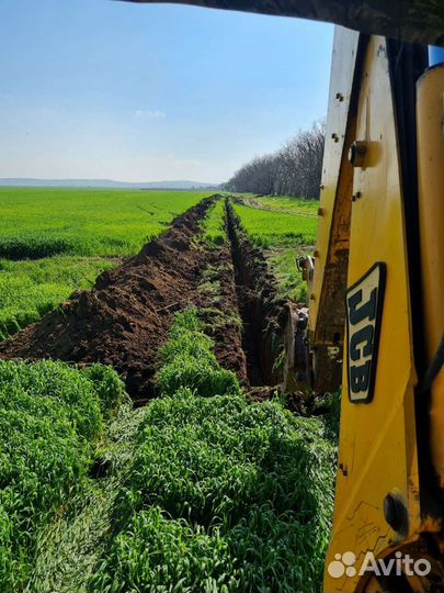 Услуги экскаватора погрузчика