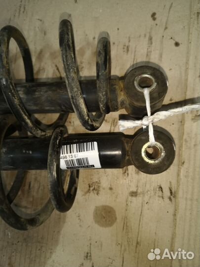 Амортизатор задний Mazda Demio DY5W