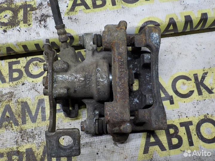 Суппорт задний левый Toyota Corolla (E150) 2006-2