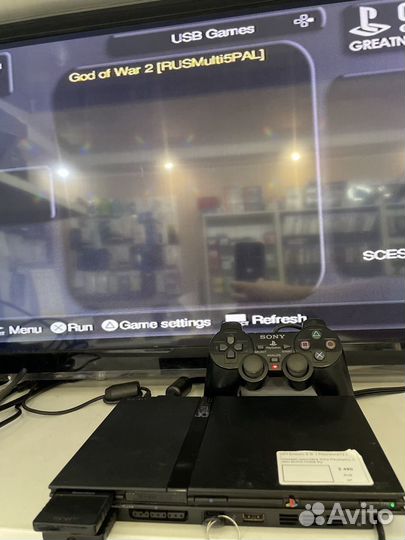 Sony PlayStation 2 Slim с играми