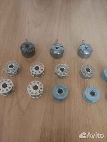 Шпульки и шпульные колпачки