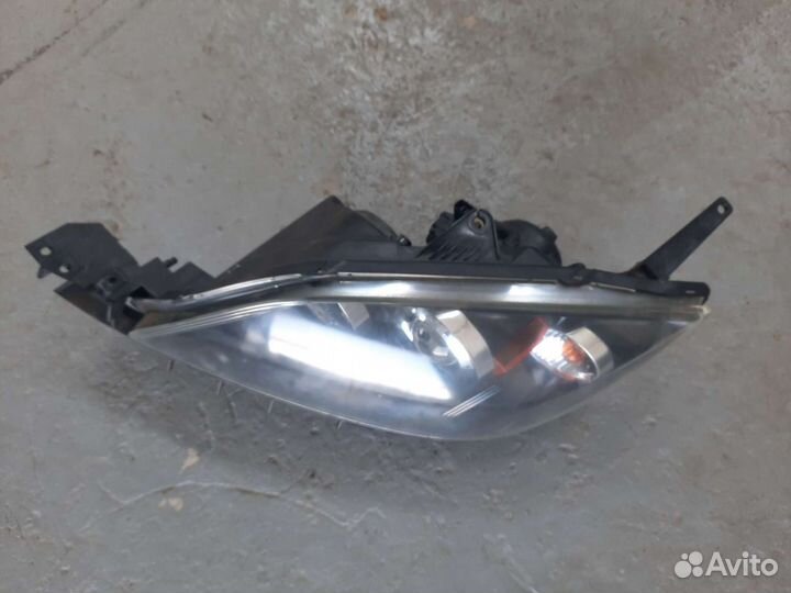 Передняя левая фара Мазда 3 галоген хеч