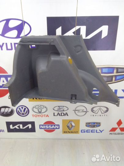 Обшивка багажника Kia RIO 2 Лев