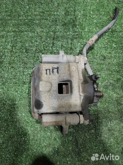 Суппорт тормозной передний правый Mazda Familia