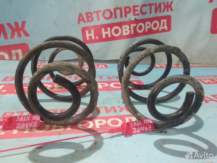 Пружина задняя Nissan March K12