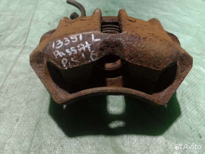 Суппорт передний левый Volkswagen Passat B5