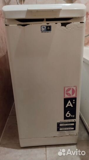 Стиральная машина с вертикальной загрузкой