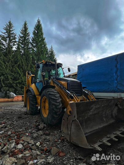 Машинист экскаватора погрузчика Caterpillar 434Е