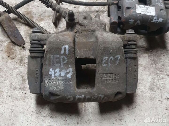 Суппорт левый Geely Emgrand ec7