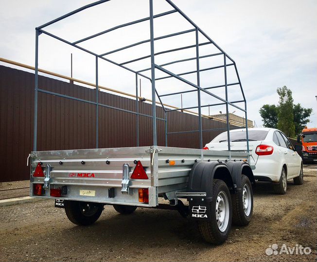 Двухосный прицеп для строй материалов и др. грузов