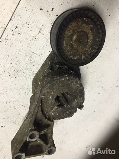 06A903315F Натяжитель ремня VAG