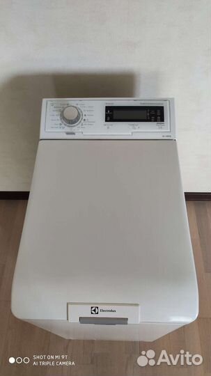 Стиральная машина с вертикальной загрузкой