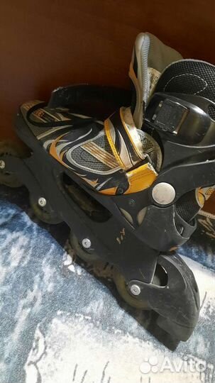 Роликовые коньки