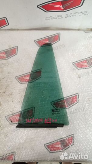 Стекло задней правой двери Опель Астра Н