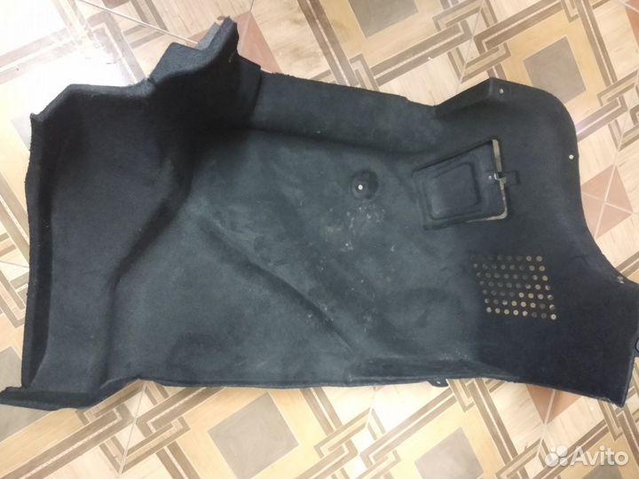 Обшивка багажника для KIA Rio правая