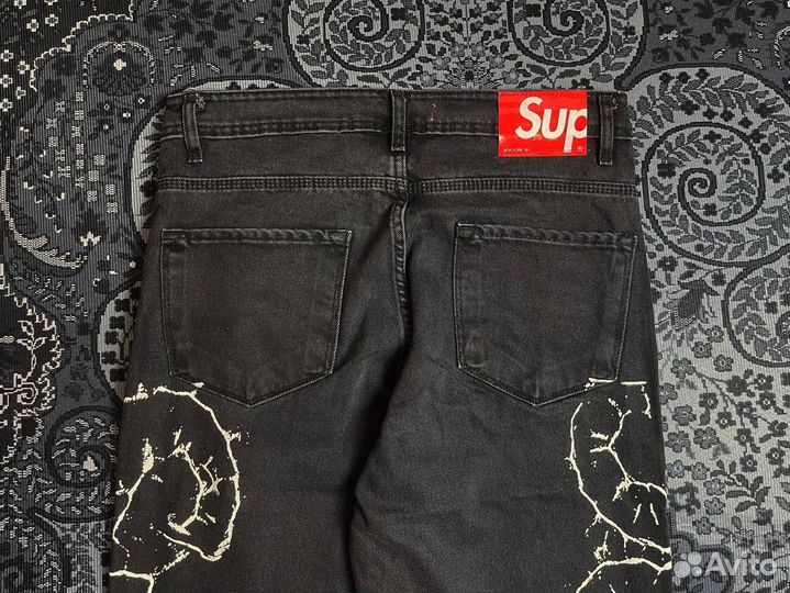 Джинсы supreme
