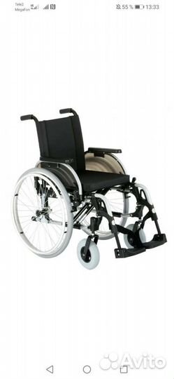 Кресло коляска для инвалидов с ручным приводом