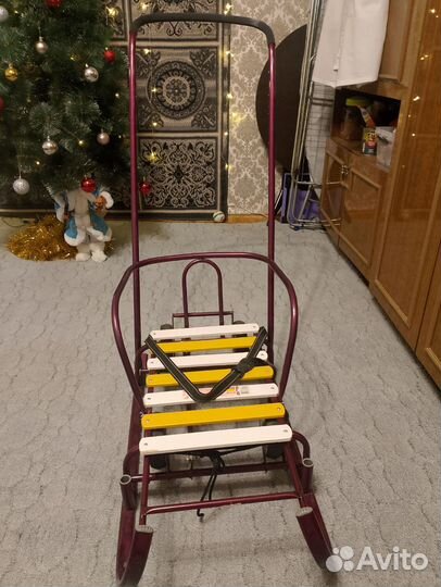 Детские санки с выдвижными колесами