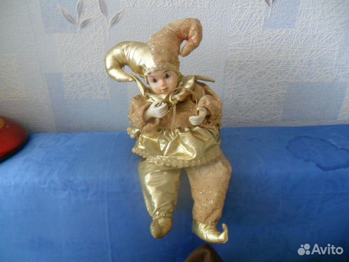 Музыкальный заводной клоун. 28 см. Красивый