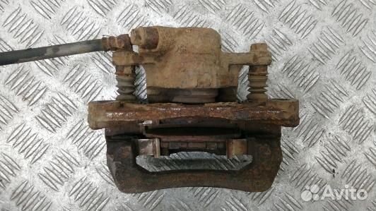 Суппорт тормозной задний правый subaru impreza 3