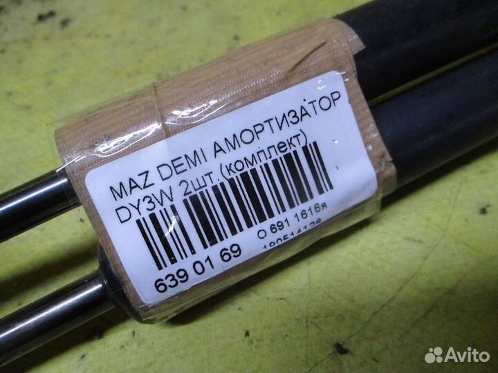 Амортизатор двери Mazda Demio DY3W