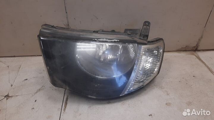 Фара левая Mitsubishi L200