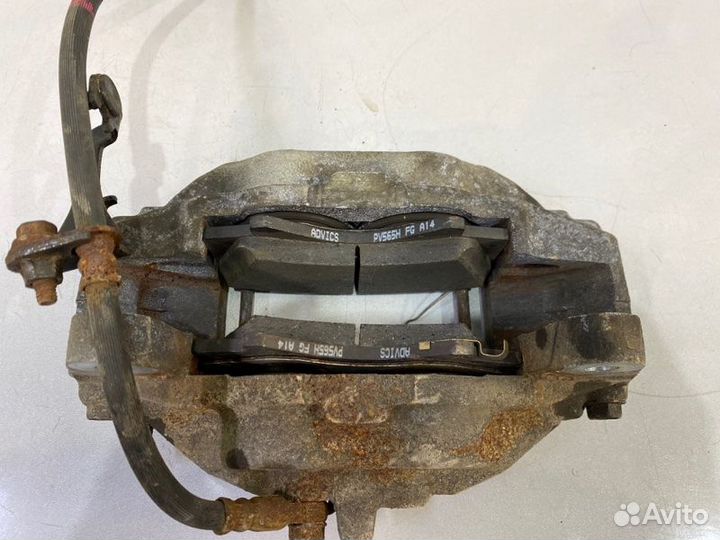 Суппорт передний левый Toyota Land Cruiser 200