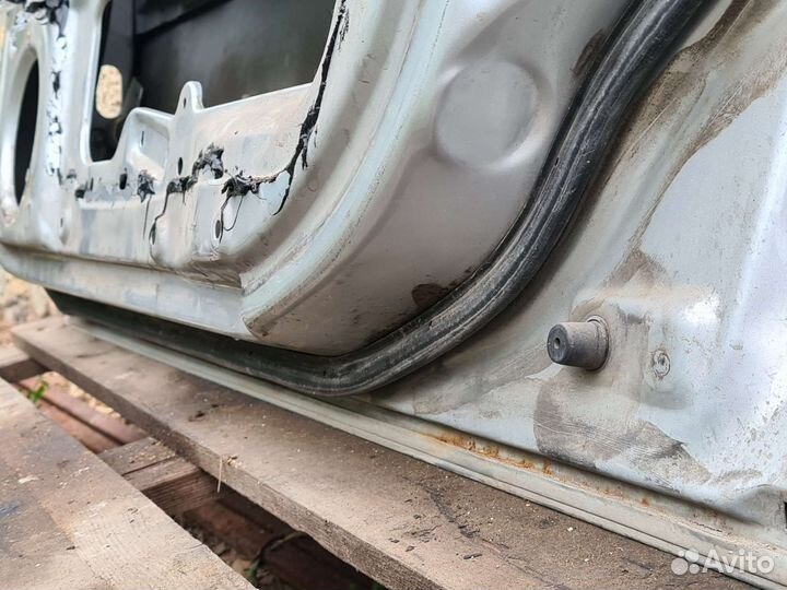 Передняя правая дверь Kia Spectra