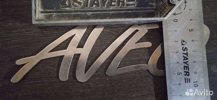 Надпись aveo