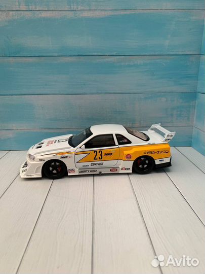 Модель авто Nissan Skyline GT-R R34 lbwk 1:24