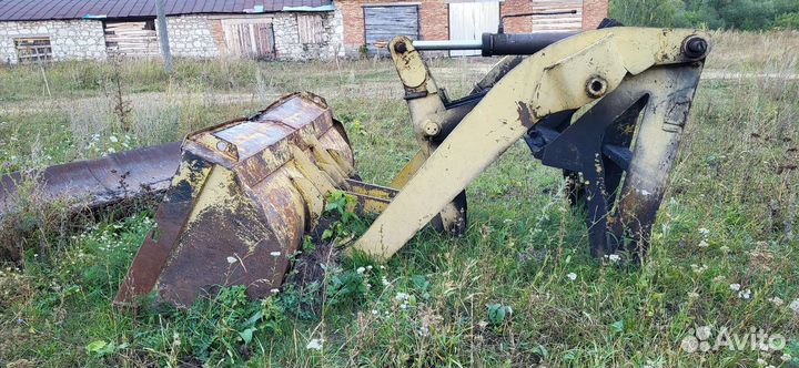 Фронтальный погрузчик на т150к