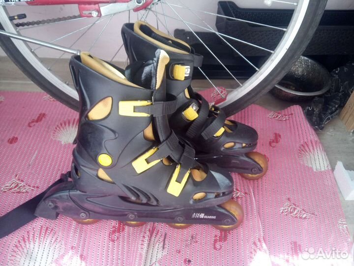 Роликовые коньки