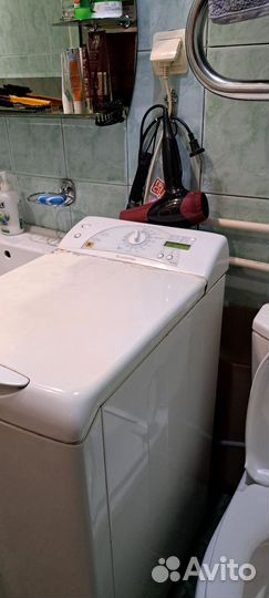 Стиральная машина с вертикальной загрузкой