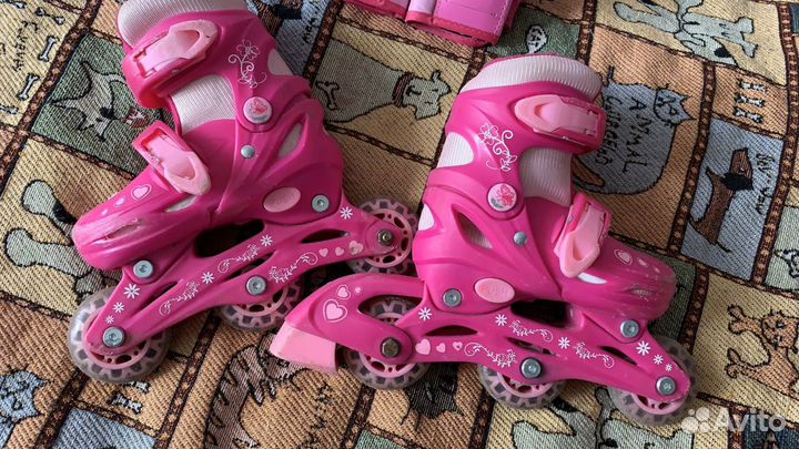 Роликовые коньки